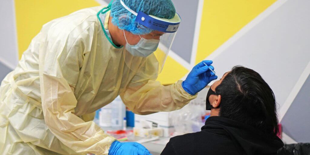 Individual getting COVID swabbed