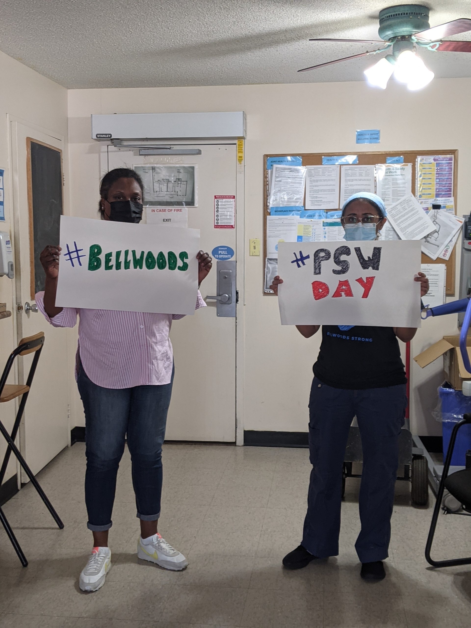 Bellwoods staff holds up signs #Bellwoods and #PSW Day